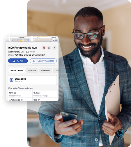 A property professional reviewing data on a phone, with property details overlay